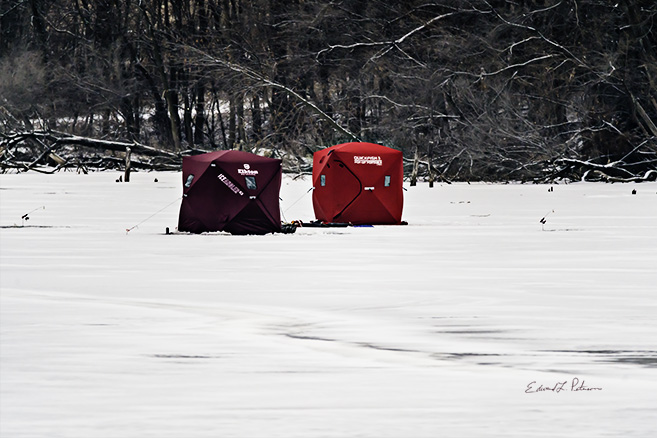Just a few days before this photo was taken this lake had no ice. A few days of cold the it is frozen over. Get a little ice and there is no stopping a fisherman! A day after this photo was taken and it is back in the 40s.

An image may be purchased at http://fineartamerica.com/featured/no-stopping-a-fisherman-edward-peterson.html?newartwork=true