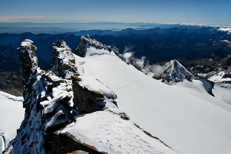 View towards the middle 4015m and Il Roc 4026m eastern summits of Gran Paradiso from Madonna summit 4052m 