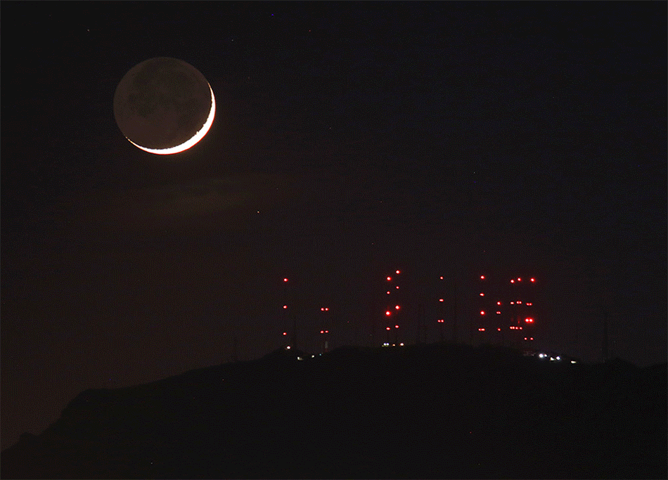 Crescent Moonset Behind South Mountain Towers