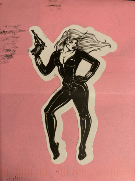 Girl with gun sticker