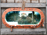 Self portrait in porthole.  Sorry for small picture, it's a small porthole.