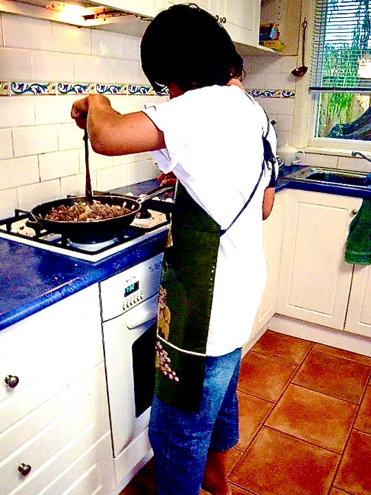 Max cooks dinner, January, 2010