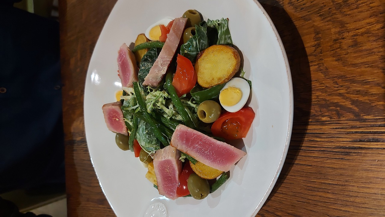 Enjoying Salad with Synthetic Tuna