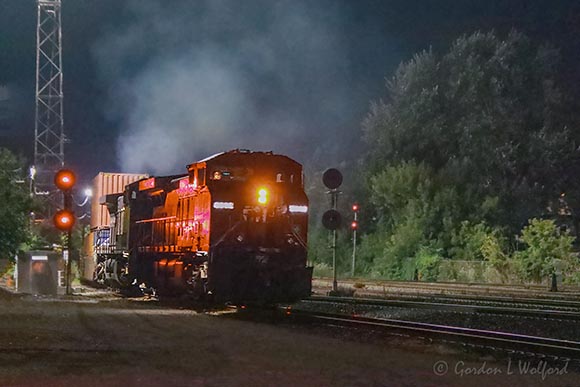 Eastbound Night Train Entering Rail Yard 90D74782