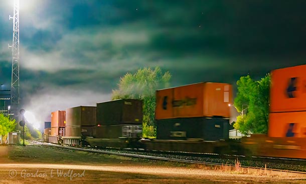 Eastbound Train Departing Into Night Fog 90D129496