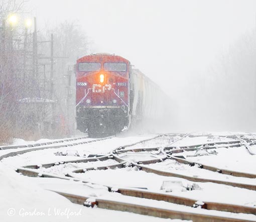 Eastbound CPKC Train In Snowfall DSCN018196