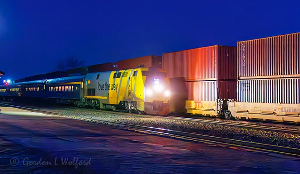 VIA Rail 41 Passing Freight Cars At Dawn 90D148077