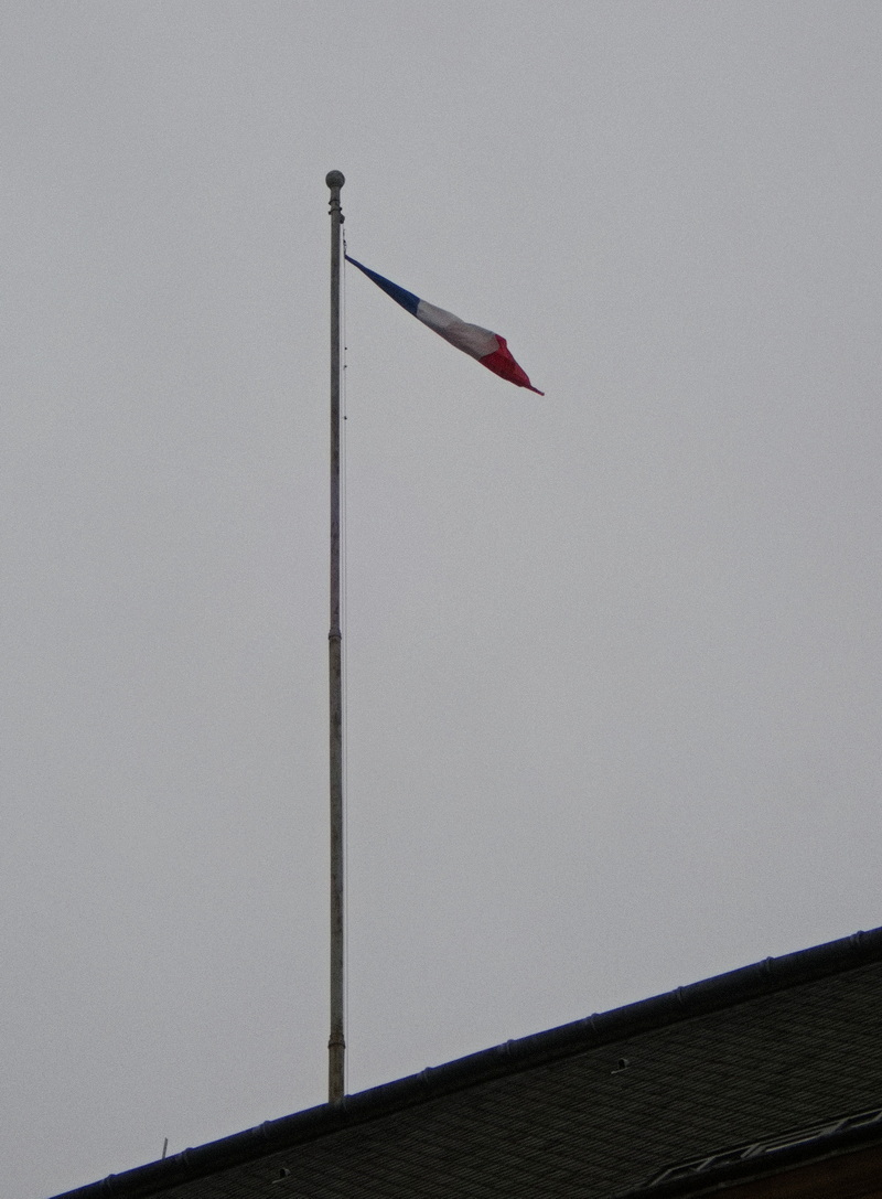 French flag hanging by a thread - Metz town hall
