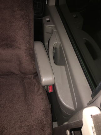 With seat mounted, door squishes armrests