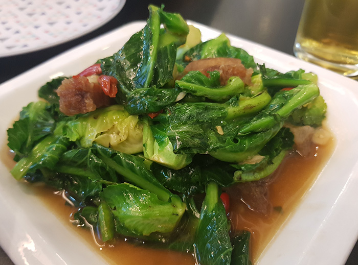 Kale with crispy pork in oyster sauce