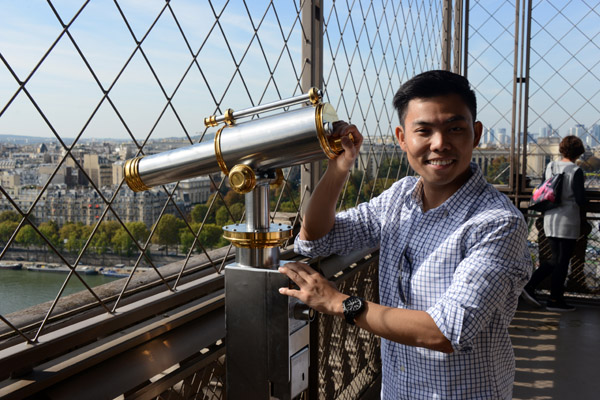 Max and a telescope at the Eiffel Tower