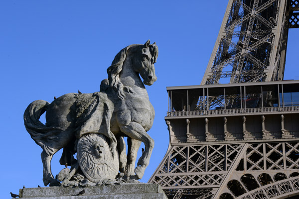 Antoine-Augustin Prault's 1853 horse with the first level of the Eiffel Tower