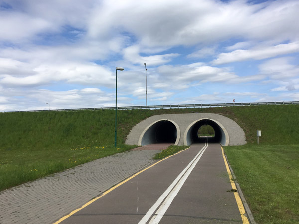 Velodorozhka cyclepath passing through a tunnel beneath at the Minsk Beltway