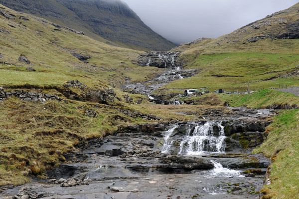 Cascading stream above Bøur, Faroe Islands