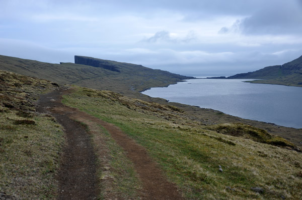 The Bøsdalafossur trail follows the eastern side of the lake, Vágar