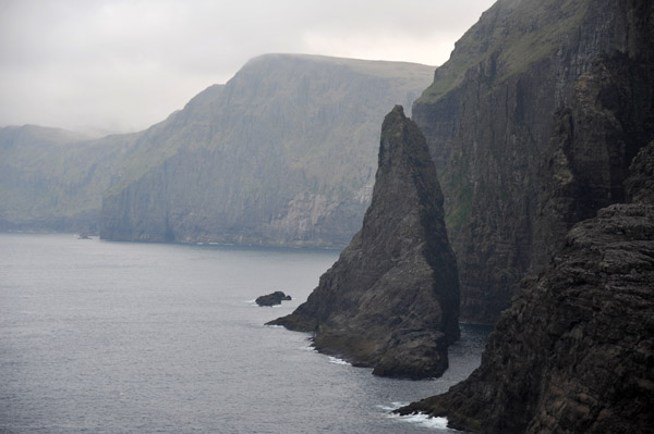Shark-tooth shaped rock separated from the island of Vágar, Faroe Islands