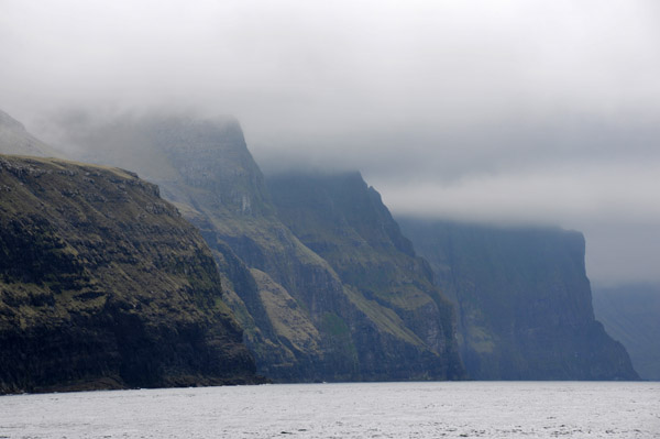 North coast of Vgar in thick clouds, Faroe Islands