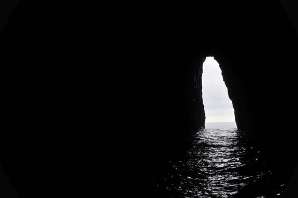 Inside a large sea cave on the Sjferir boat tour of the west coast of Streymoy