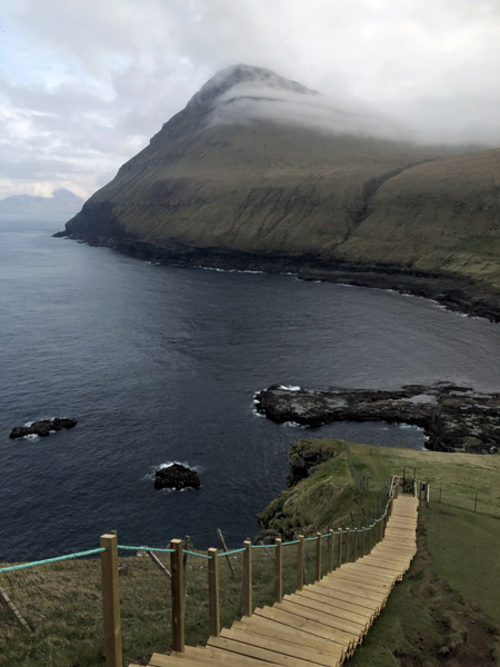 Wooden staircase up the cliffs north of Gjgv