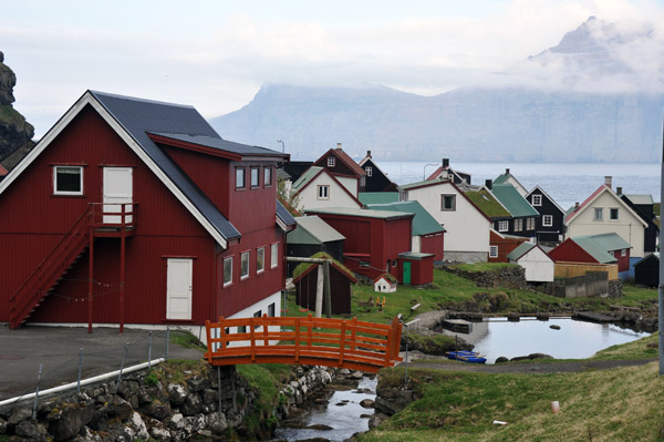 Footbridge over the stream in the center of Gjgv, Eysturoy, Faroe Islands