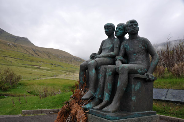 Janus Kamban's memorial is a woman with two children looking out to sea