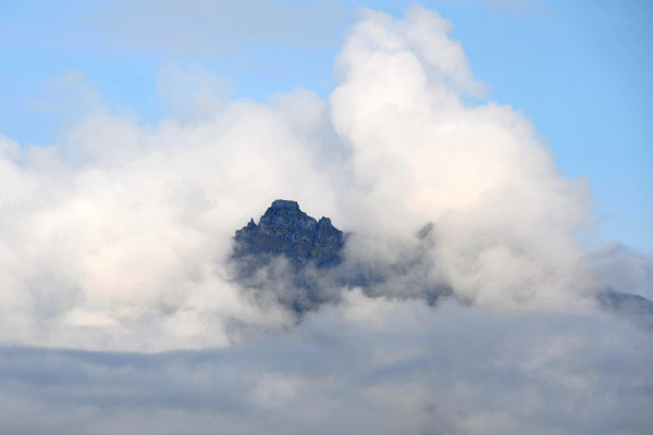 Mountaintop emerging from the clouds, Gjgv, Eysturoy, Faroe Islands