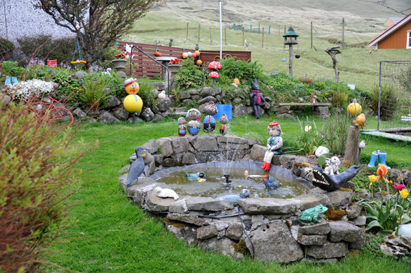 Fountain with colorful decorations, Gjgv, Faroe Islands