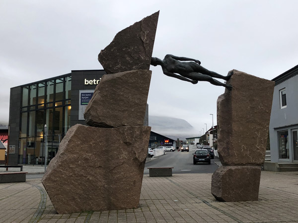 Sculpture of a woman between two stones, Klasvk, Faroe Islands