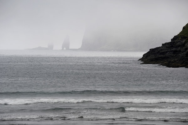 Risin og Kellingin sea stacks off the northwest coast of Eysturoy from the beach at Tjrnuvk