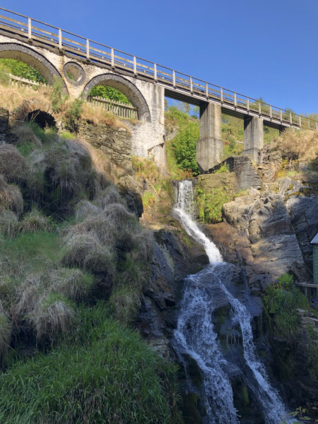 Small cascade passing beneath the aqueduct