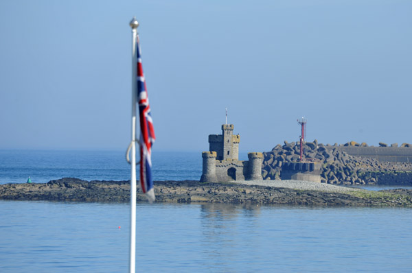 Union Jack of the Douglas War Memorial with the Tower of Refuge, IOM