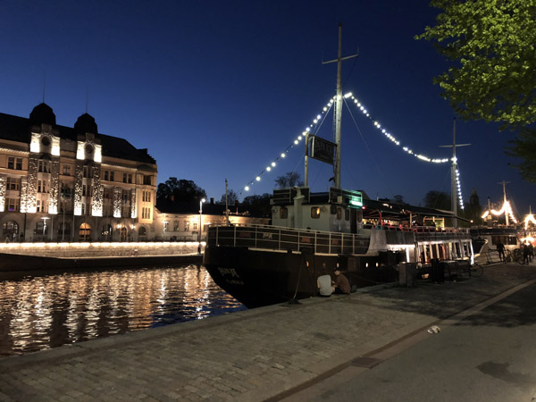 Half a dozen old ships that have been converted to floating bar-restaurants line the south bank of the Aura River, Turku