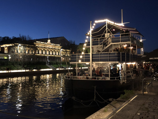 Half a dozen old ships that have been converted to floating bar-restaurants line the south bank of the Aura River, Turku