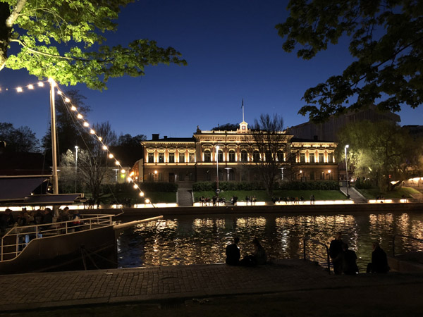 Turku City Hall across the Aura River at night