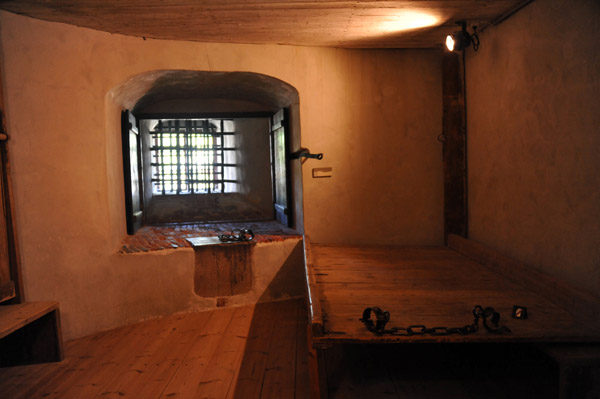 Prison cell on the lower level of the large round tower of Turku Castle