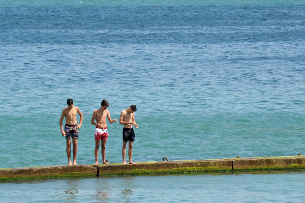 Three guys on the breakwater, Arcadia Beach, Odessa