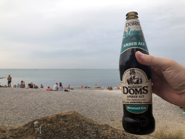 Robert Doms Amber Ale on the beach in Odessa