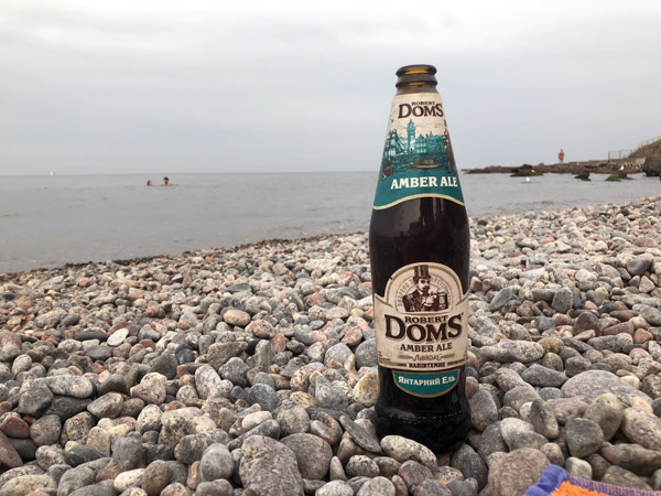 Robert Doms Amber Ale on the beach in Odessa