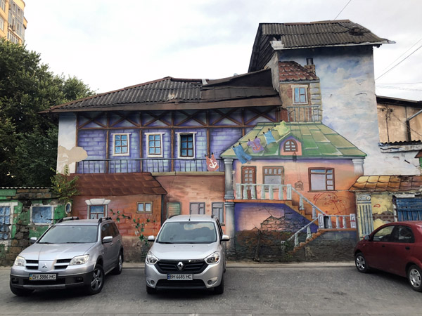 Wall mural beautifying a derelict building, Odessa