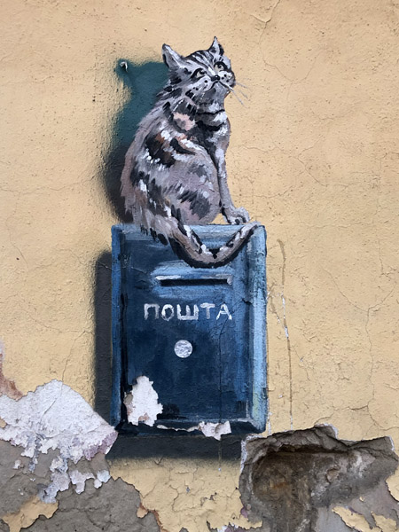 Mural of a cat on a Post Box 