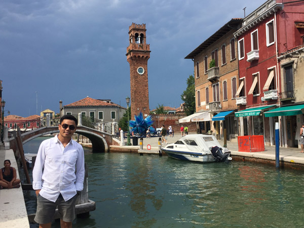 Max with the Clock Tower of Murano