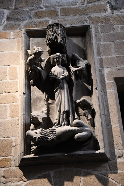 Sculpture over the door leading to the Cloister