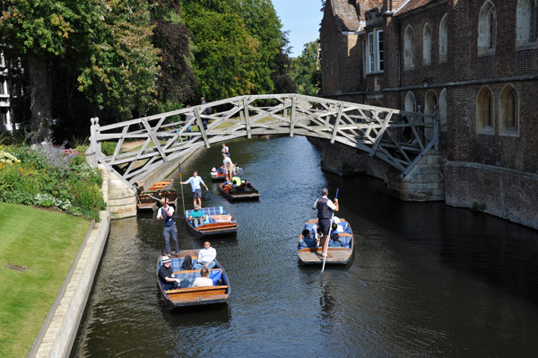 Punters passing under the Mathematical Bridge on the River Cam