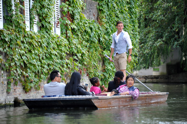 Tourists punting on the River Cam, Cambridge