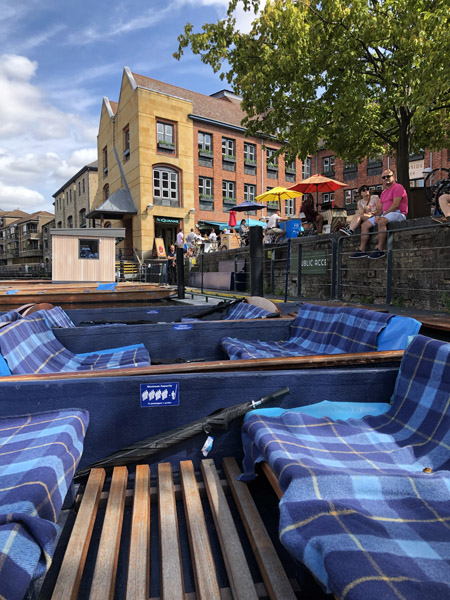 Boarding a punt on the River Cam