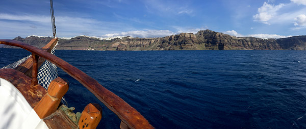 Panorama from the boat headed back to the Old Port of Fira, Santorini