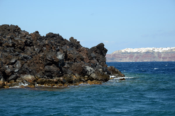 Volcanic rock of the island of Nea Kameni in the center of Santorini's caldera