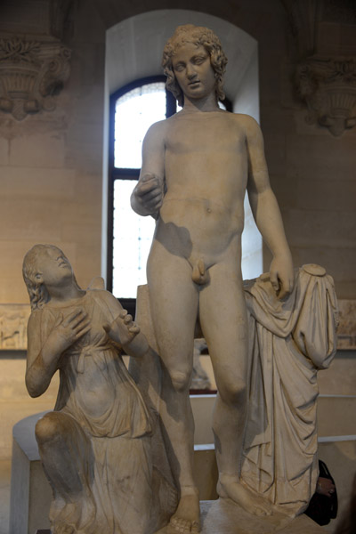 Girl looking up at a young male nude