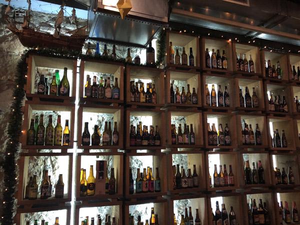 Nice backlit shelves with old beer bottles, Barley Cargo
