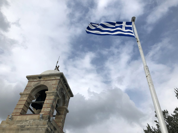 Greek flag atop Mount Lycabettus, Athens